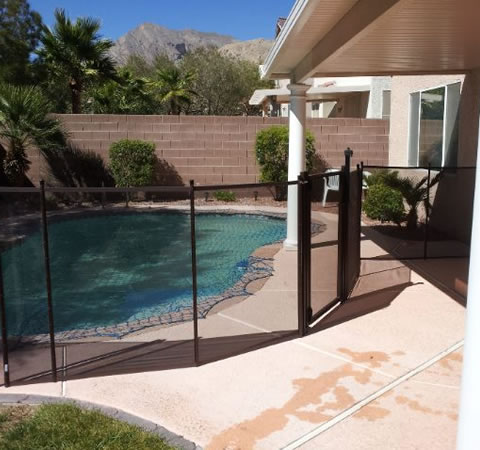 pool with black fence installed